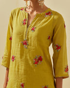 Yellow tissue chanderi straight kurta set with randomly placed hand cut silk flower bunches, highlighted with gold sequins.