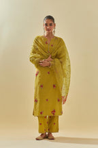 Yellow tissue chanderi straight kurta set with randomly placed hand cut silk flower bunches, highlighted with gold sequins.