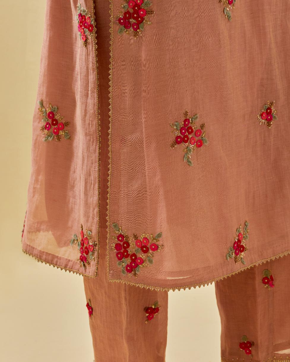 Pink tissue chanderi straight kurta set with randomly placed hand cut silk flower bunches, highlighted with gold sequins.