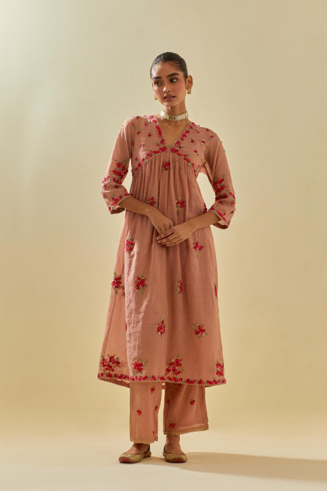 Pink tissue chanderi hand cut silk flower embroidered kurta dress set with fine gathers at empire line.