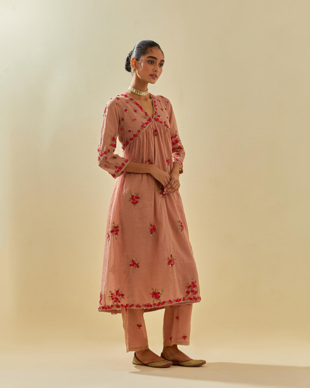 Pink tissue chanderi hand cut silk flower embroidered kurta dress set with fine gathers at empire line.