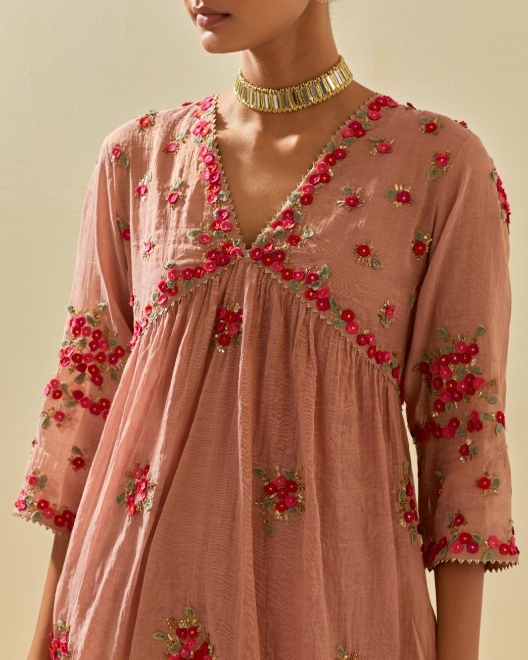 Pink tissue chanderi hand cut silk flower embroidered kurta dress set with fine gathers at empire line.