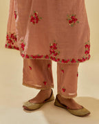 Pink tissue chanderi hand cut silk flower embroidered kurta dress set with fine gathers at empire line.