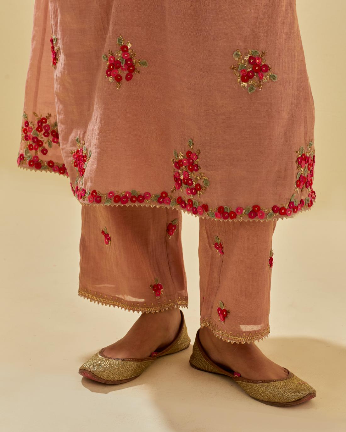 Pink tissue chanderi hand cut silk flower embroidered kurta dress set with fine gathers at empire line.