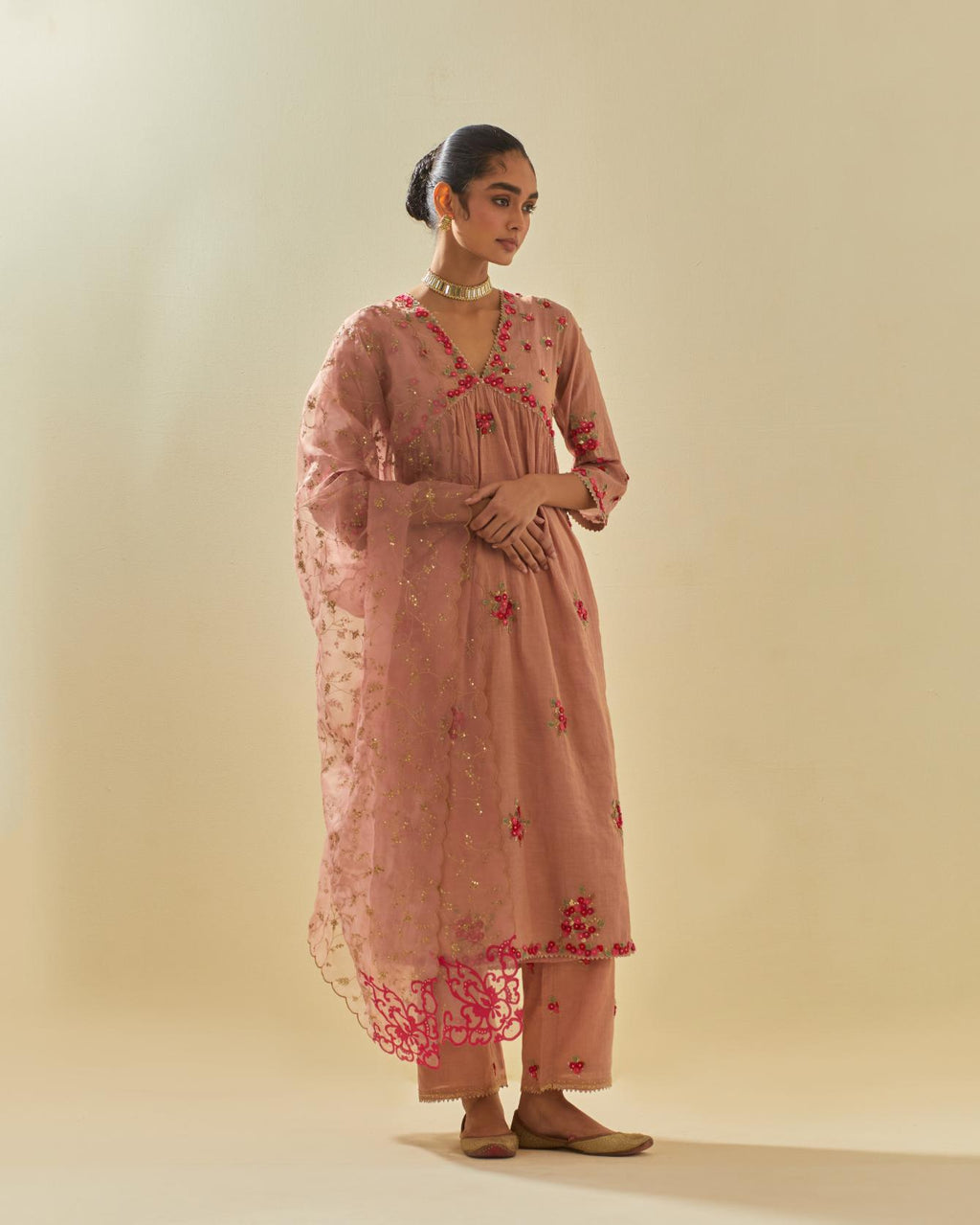 Pink tissue chanderi hand cut silk flower embroidered kurta dress set with fine gathers at empire line.
