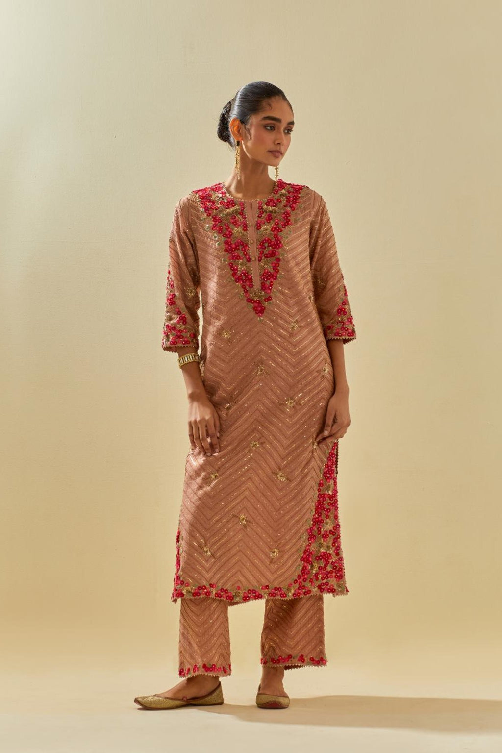 Pink tissue chanderi straight kurta set with delicate hand cut silk flower embroidery, highlighted with gold sequins and beads.
