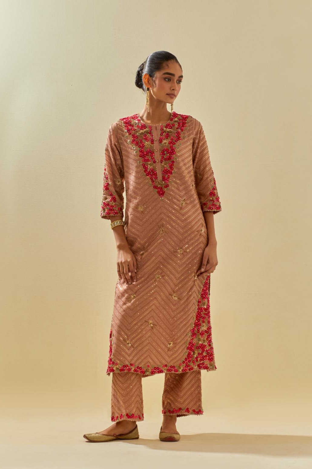 Pink tissue chanderi straight kurta set with delicate hand cut silk flower embroidery, highlighted with gold sequins and beads.