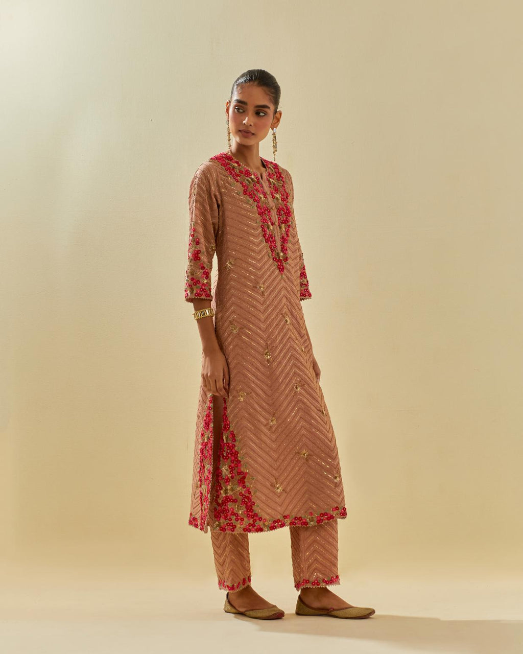 Pink tissue chanderi straight kurta set with delicate hand cut silk flower embroidery, highlighted with gold sequins and beads.