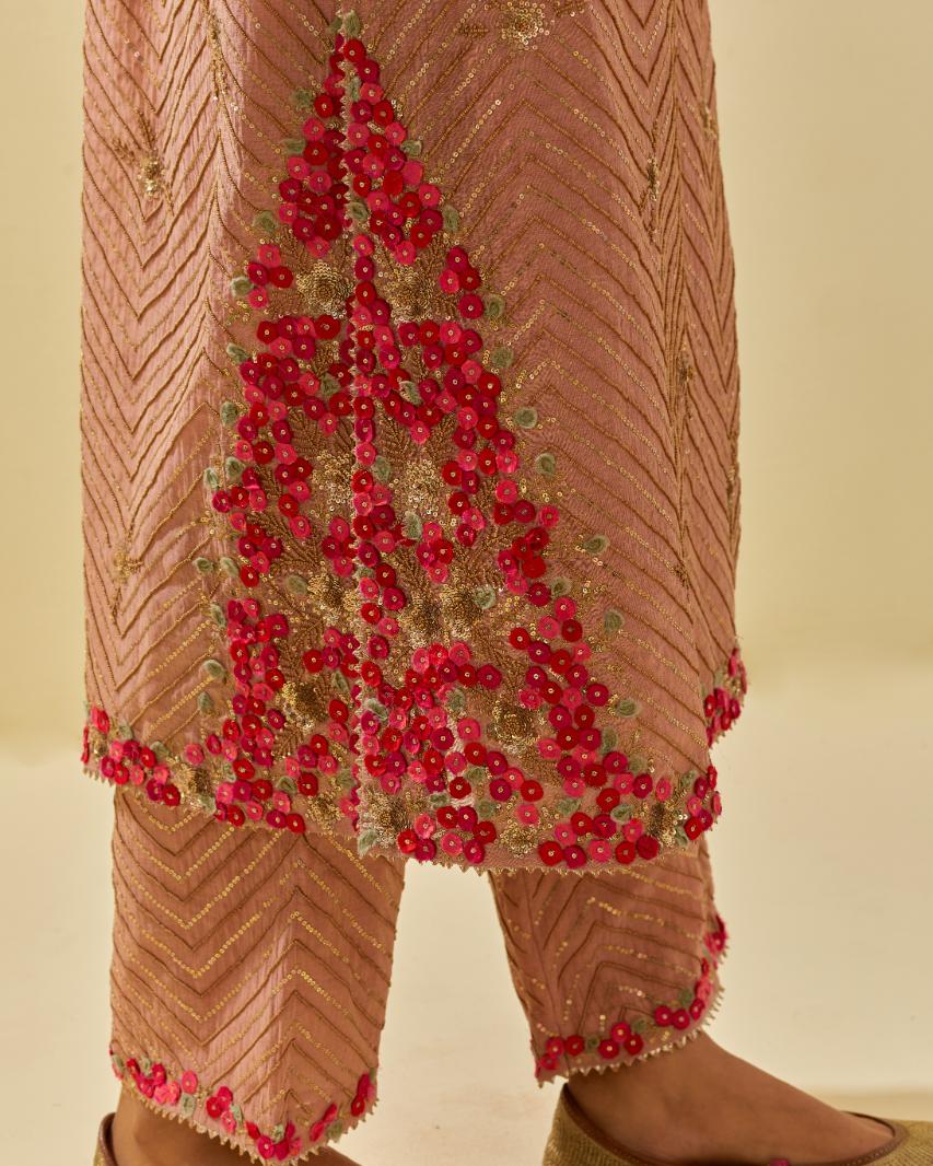 Pink tissue chanderi straight kurta set with delicate hand cut silk flower embroidery, highlighted with gold sequins and beads.
