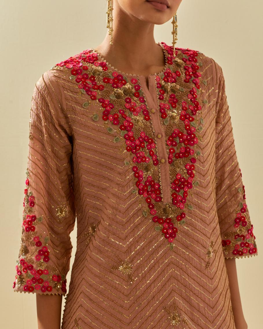 Pink tissue chanderi straight kurta set with delicate hand cut silk flower embroidery, highlighted with gold sequins and beads.