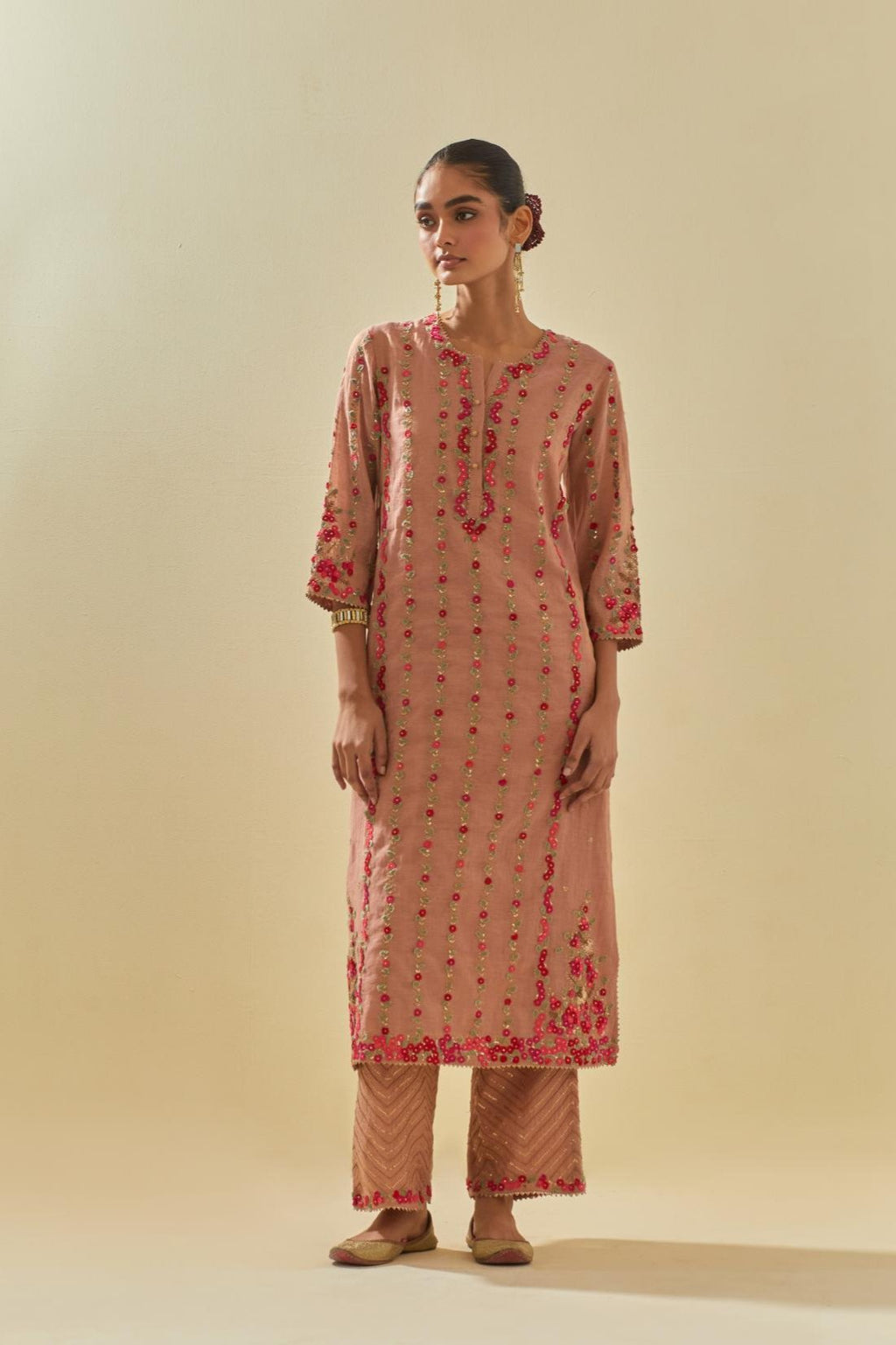 Pink tissue chanderi paneled kurta set with front placket neckline and all-over hand cut silk flower embroidery.