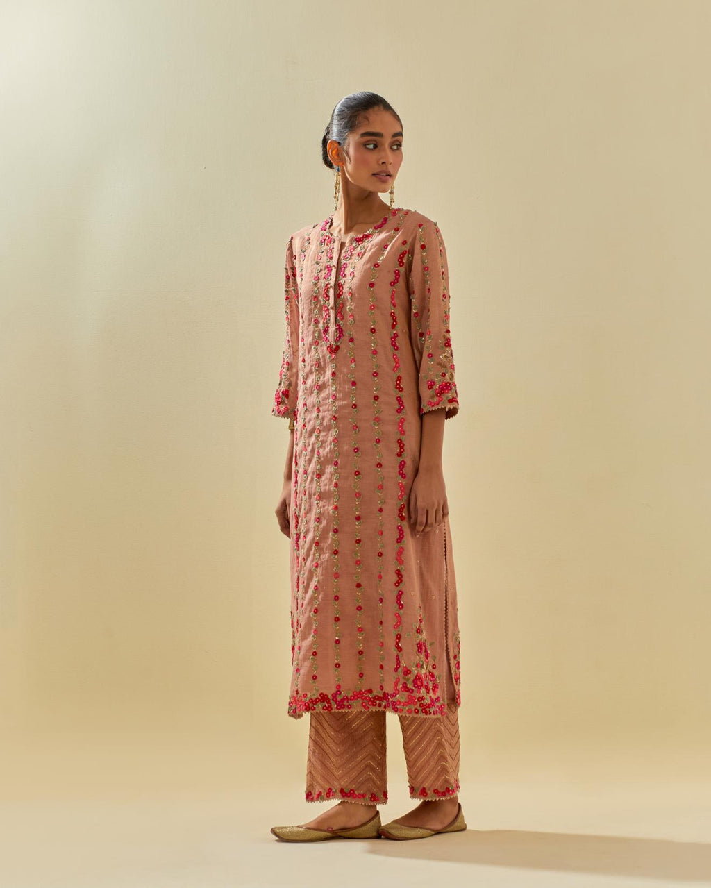 Pink tissue chanderi paneled kurta set with front placket neckline and all-over hand cut silk flower embroidery.