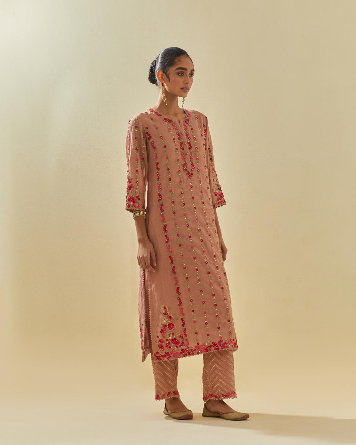 Pink tissue chanderi paneled kurta set with front placket neckline and all-over hand cut silk flower embroidery.