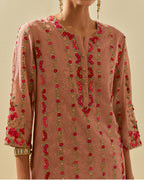 Pink tissue chanderi paneled kurta set with front placket neckline and all-over hand cut silk flower embroidery.