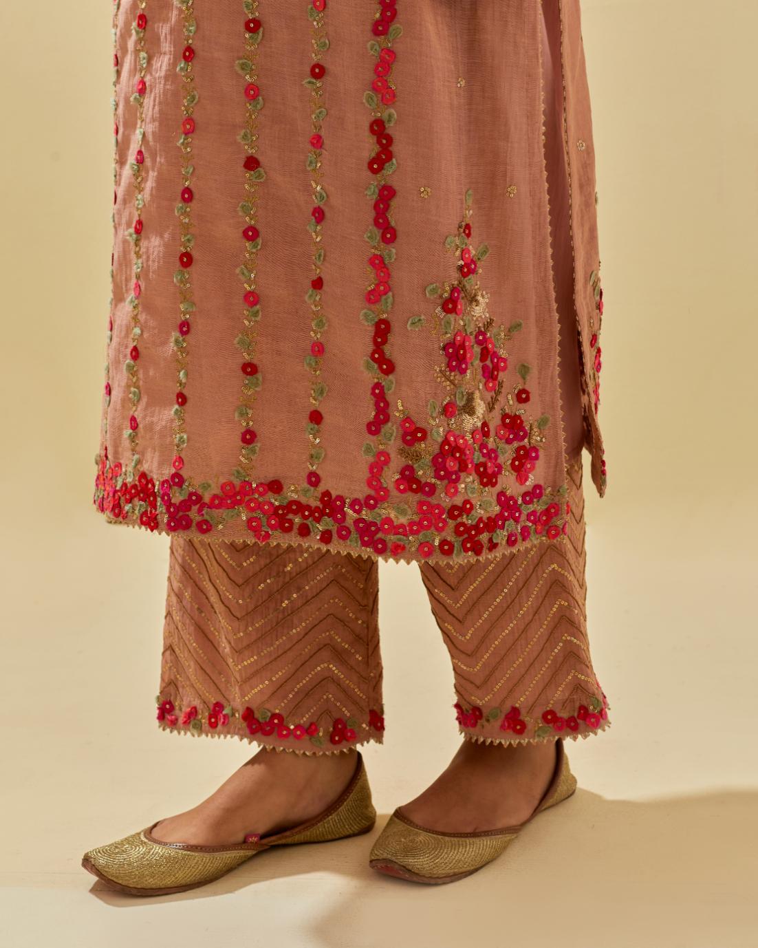 Pink tissue chanderi paneled kurta set with front placket neckline and all-over hand cut silk flower embroidery.