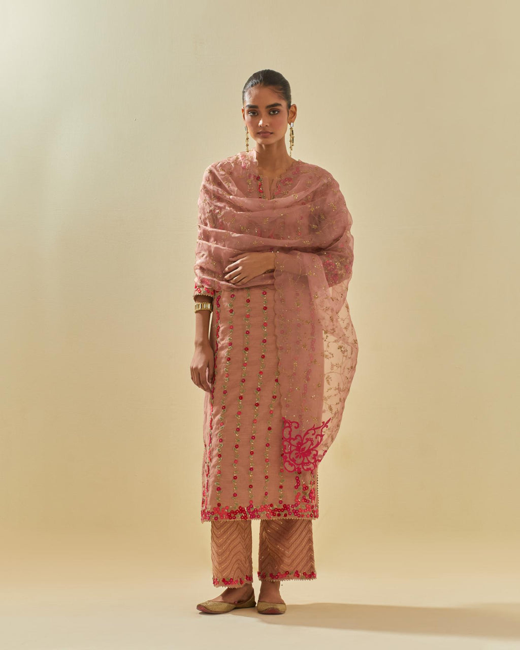 Pink tissue chanderi paneled kurta set with front placket neckline and all-over hand cut silk flower embroidery.