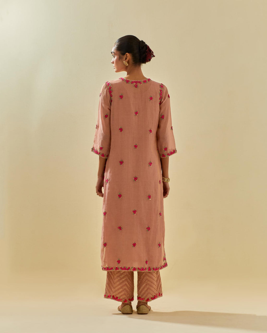 Pink tissue chanderi straight kurta set, with contrast silk hand cut flowers embroidery, highlighted with gold sequins.
