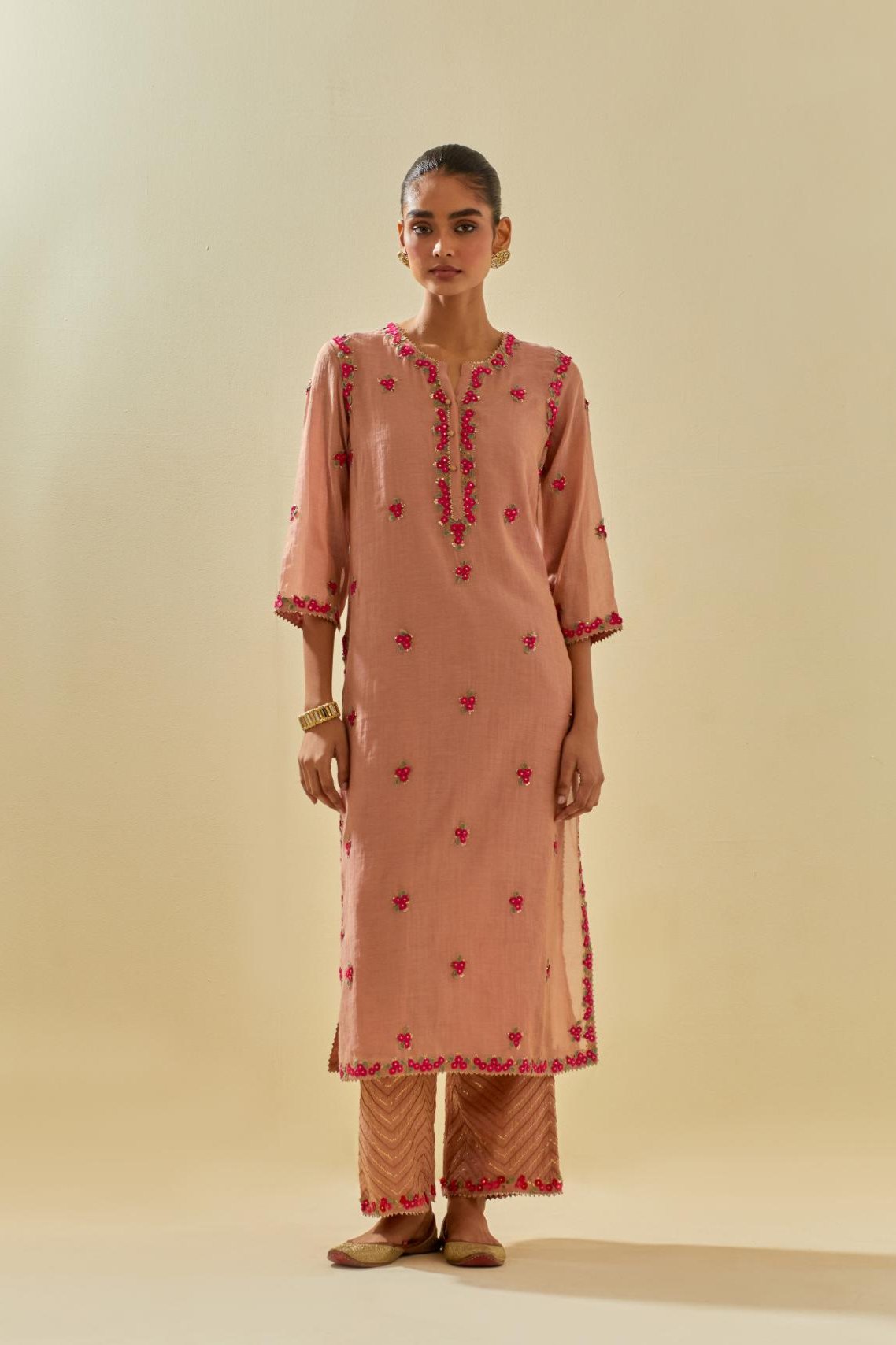 Pink tissue chanderi straight kurta set, with contrast silk hand cut flowers embroidery, highlighted with gold sequins.
