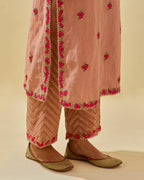 Pink tissue chanderi straight kurta set, with contrast silk hand cut flowers embroidery, highlighted with gold sequins.