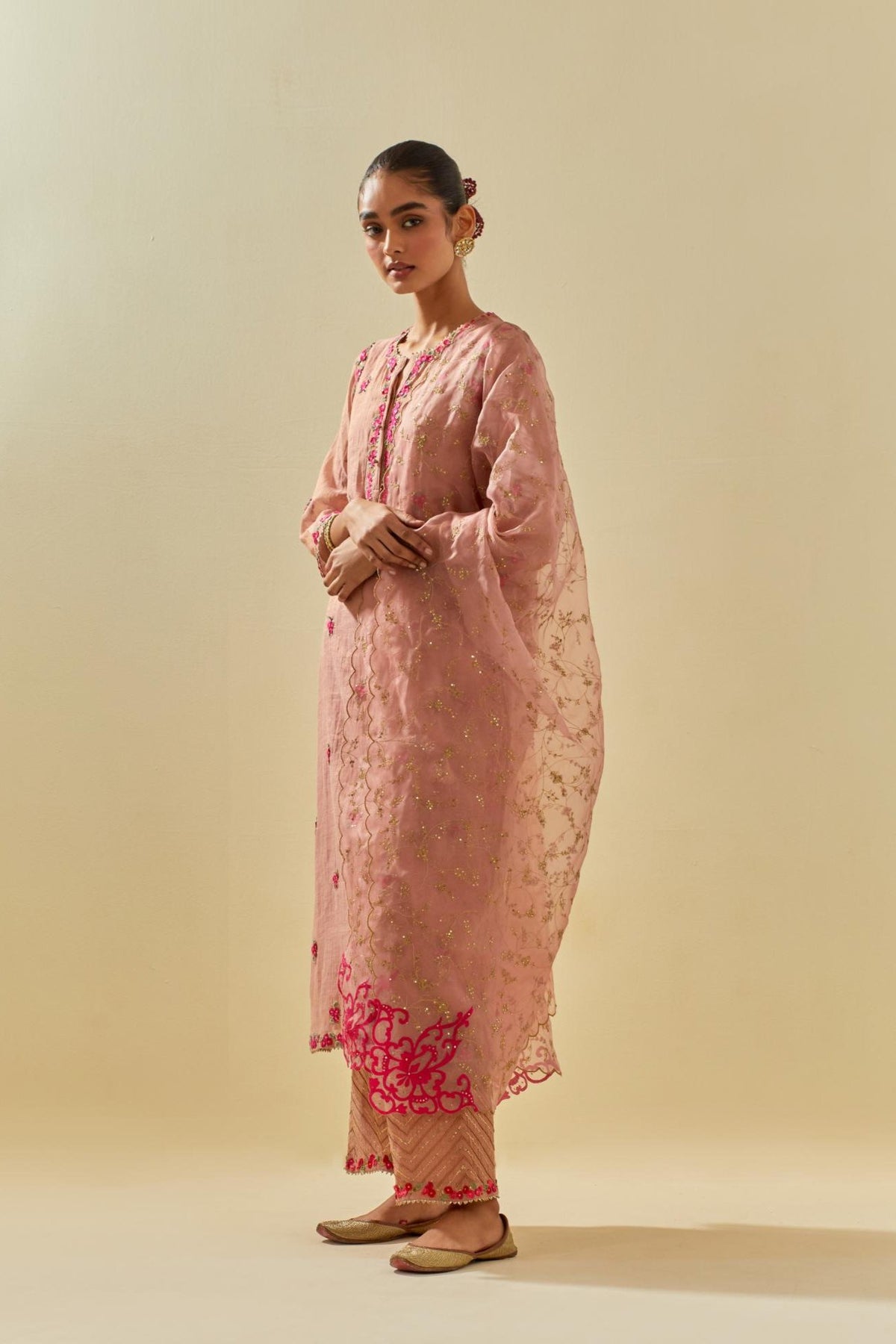 Pink silk organza dupatta with all-over delicate gold zari embroidery & silk applique work, highlighted with gold sequins.
