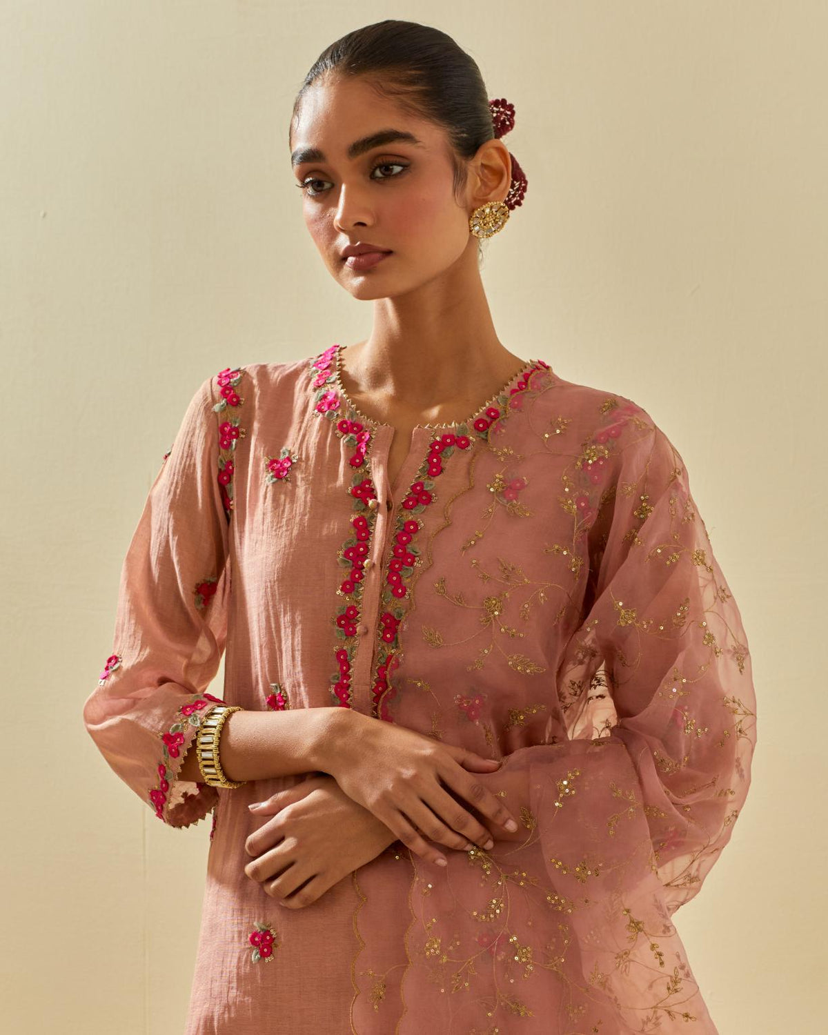 Pink tissue chanderi straight kurta set, with contrast silk hand cut flowers embroidery, highlighted with gold sequins.