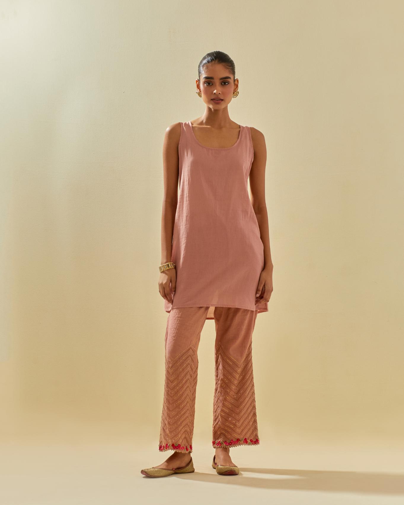 Pink tissue chanderi easy fit short kurta set, highlighted with gold sequins and beads.