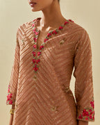 Pink tissue chanderi easy fit short kurta set, highlighted with gold sequins and beads.