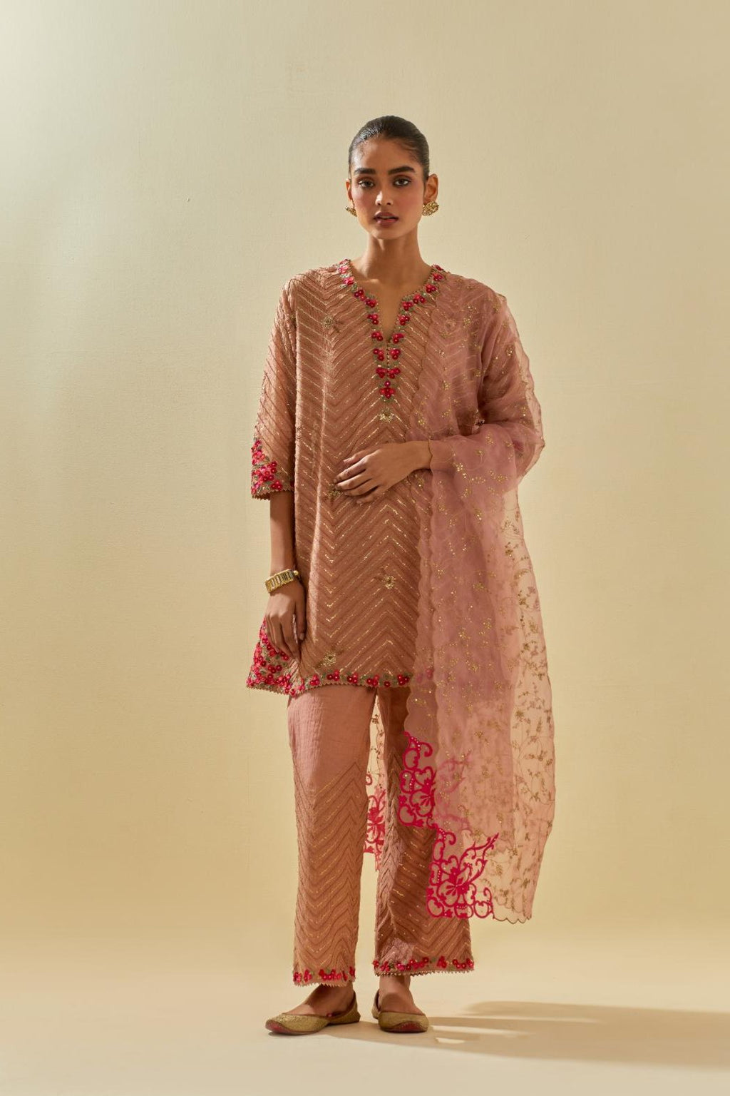 Pink tissue chanderi easy fit short kurta set, highlighted with gold sequins and beads.