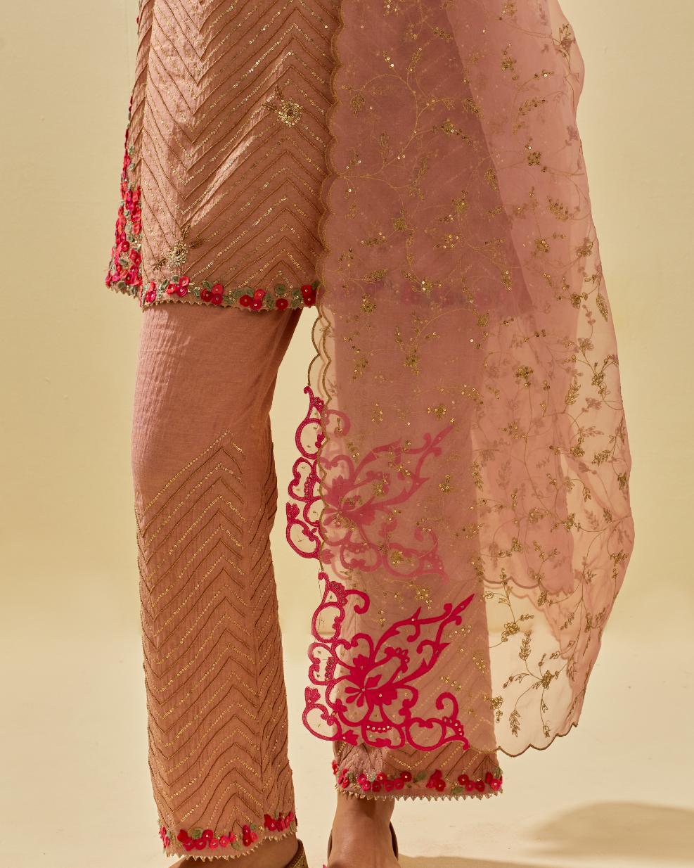 Pink tissue chanderi easy fit short kurta set, highlighted with gold sequins and beads.