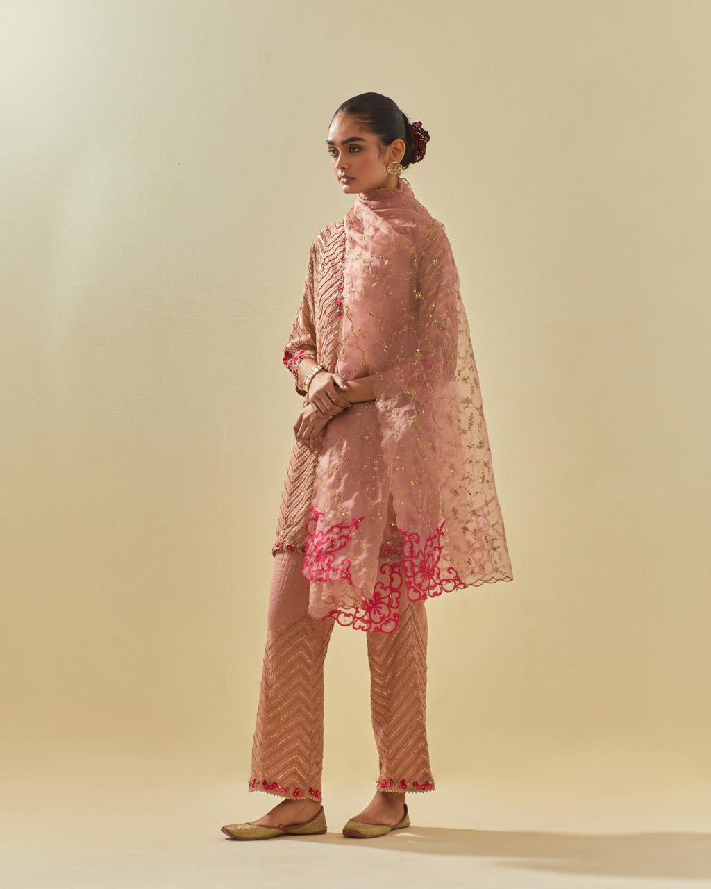 Pink tissue chanderi easy fit short kurta set, highlighted with gold sequins and beads.