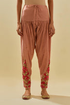 Pink tissue chanderi salwar with hand cut silk flower embroidery, highlighted with gold sequins.
