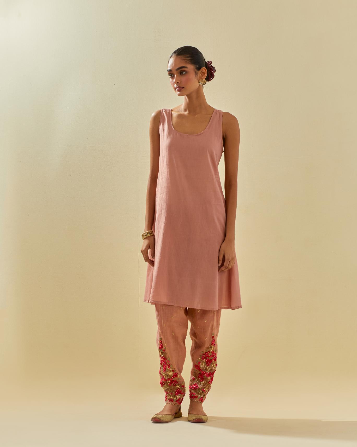 Pink tissue chanderi mid length kalidar kurta set with hand cut silk flower embroidery, highlighted with gold sequins.