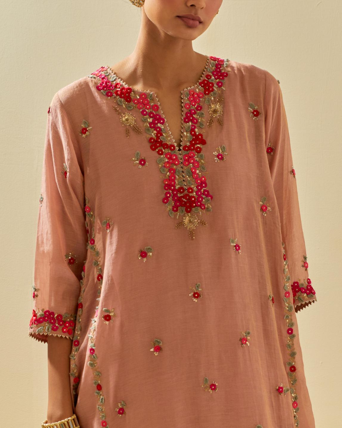 Pink tissue chanderi mid length kalidar kurta set with hand cut silk flower embroidery, highlighted with gold sequins.