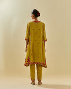 Yellow tissue chanderi mid length kalidar kurta set with hand cut silk flower embroidery, highlighted with gold sequins.