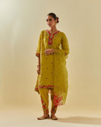 Yellow tissue chanderi mid length kalidar kurta set with hand cut silk flower embroidery, highlighted with gold sequins.