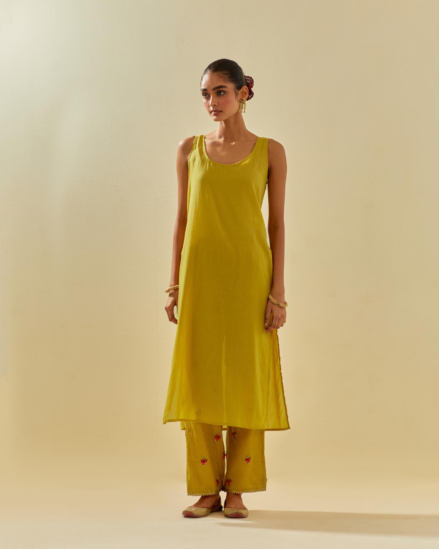 Yellow tissue chanderi hand cut silk flower embroidered kurta dress set with fine gathers at empire line.