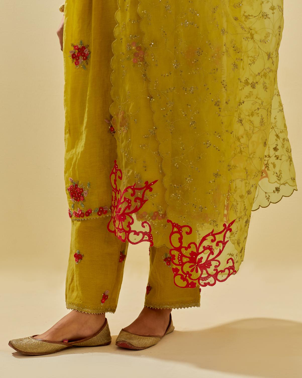 Yellow tissue chanderi hand cut silk flower embroidered kurta dress set with fine gathers at empire line.