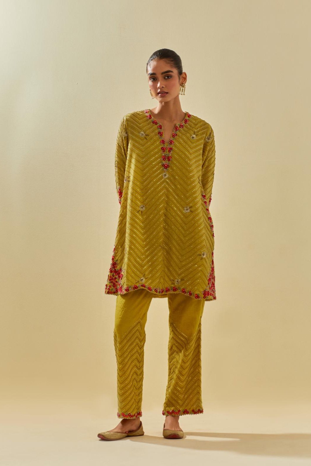 Yellow tissue chanderi easy fit short kurta set, highlighted with gold sequins and beads.