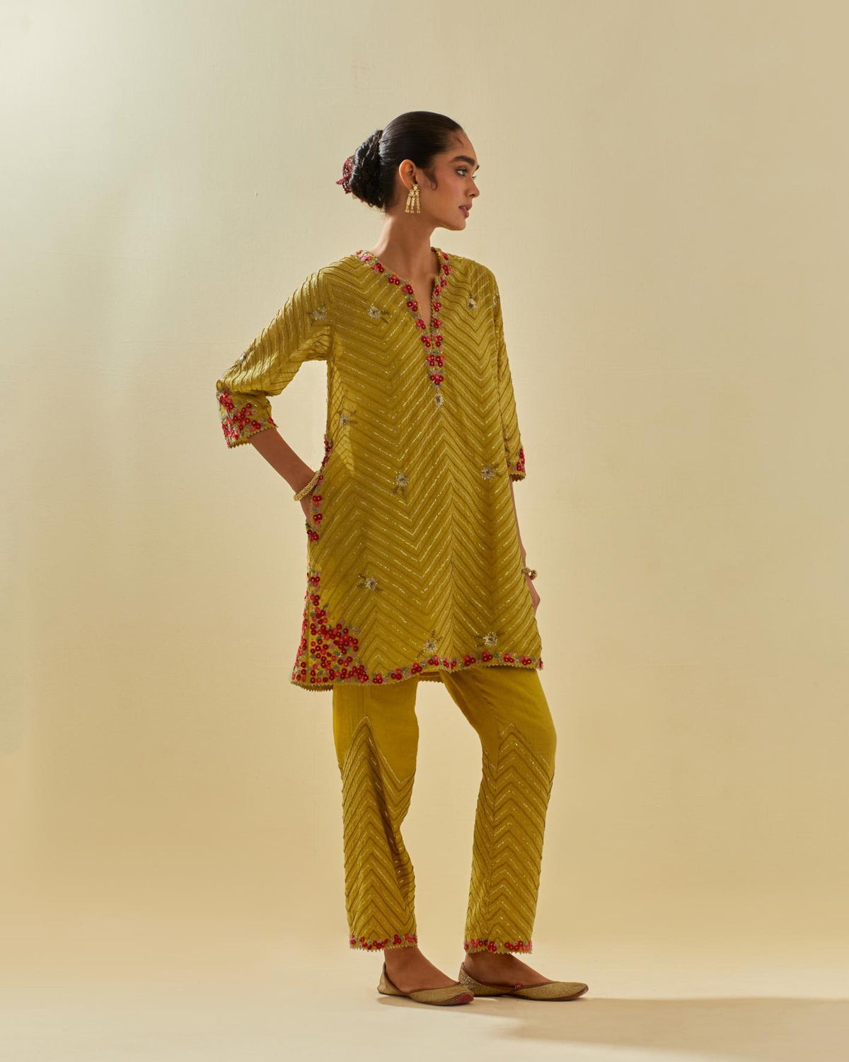 Yellow tissue chanderi easy fit short kurta set, highlighted with gold sequins and beads.