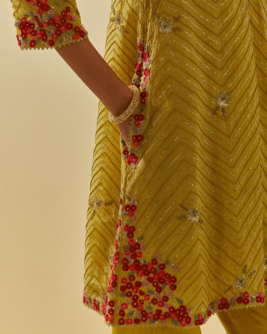 Yellow tissue chanderi easy fit short kurta set, highlighted with gold sequins and beads.