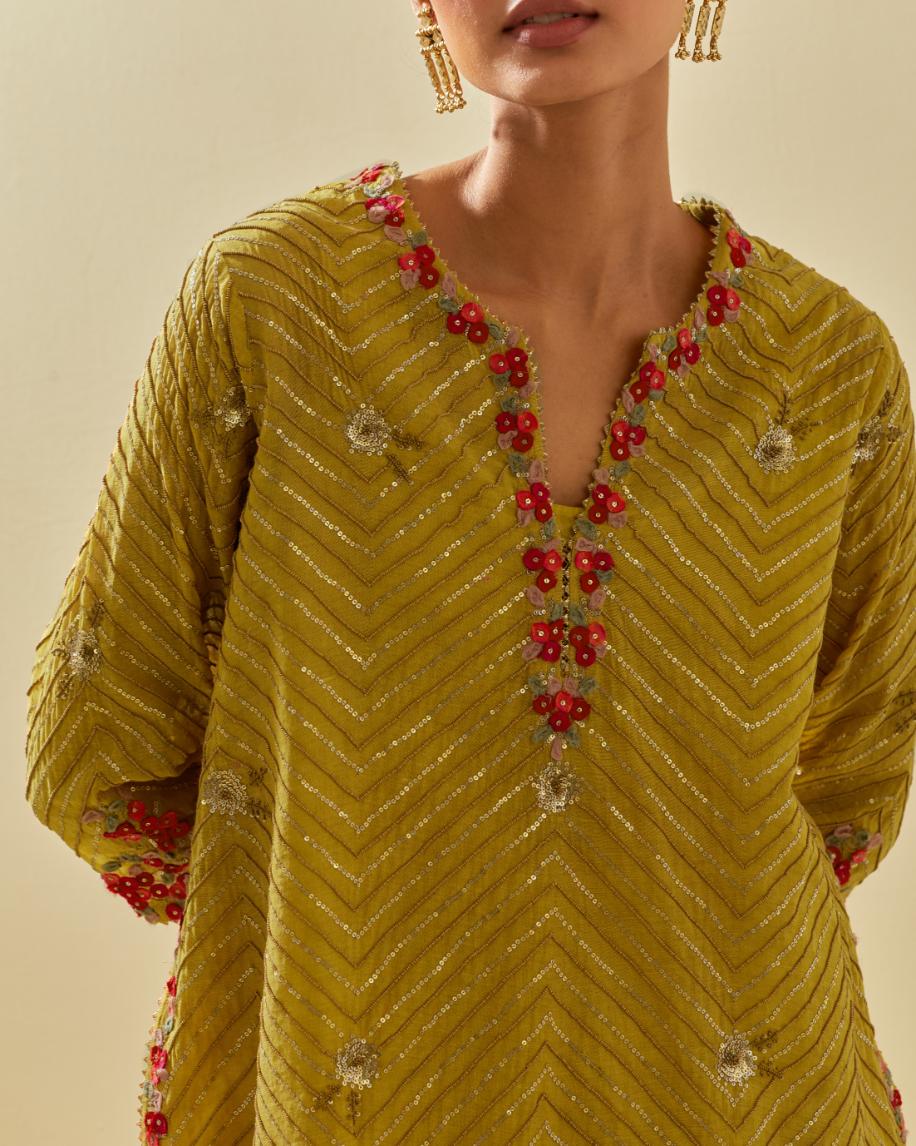 Yellow tissue chanderi easy fit short kurta set, highlighted with gold sequins and beads.