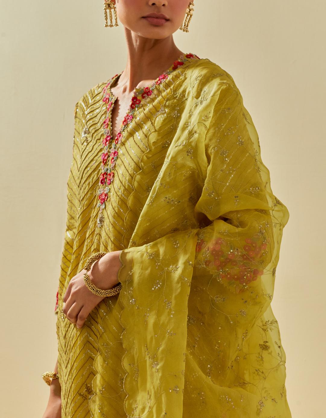 Yellow tissue chanderi easy fit short kurta set, highlighted with gold sequins and beads.