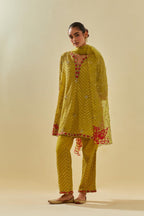Yellow tissue chanderi easy fit short kurta set, highlighted with gold sequins and beads.