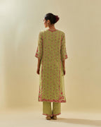 Green tissue chanderi paneled kurta set with front placket neckline and all-over hand cut silk flower embroidery.