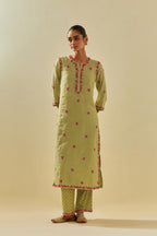 Green tissue chanderi straight kurta set, with contrast silk hand cut flowers embroidery, highlighted with gold sequins.