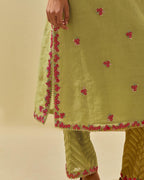 Green tissue chanderi straight kurta set, with contrast silk hand cut flowers embroidery, highlighted with gold sequins.