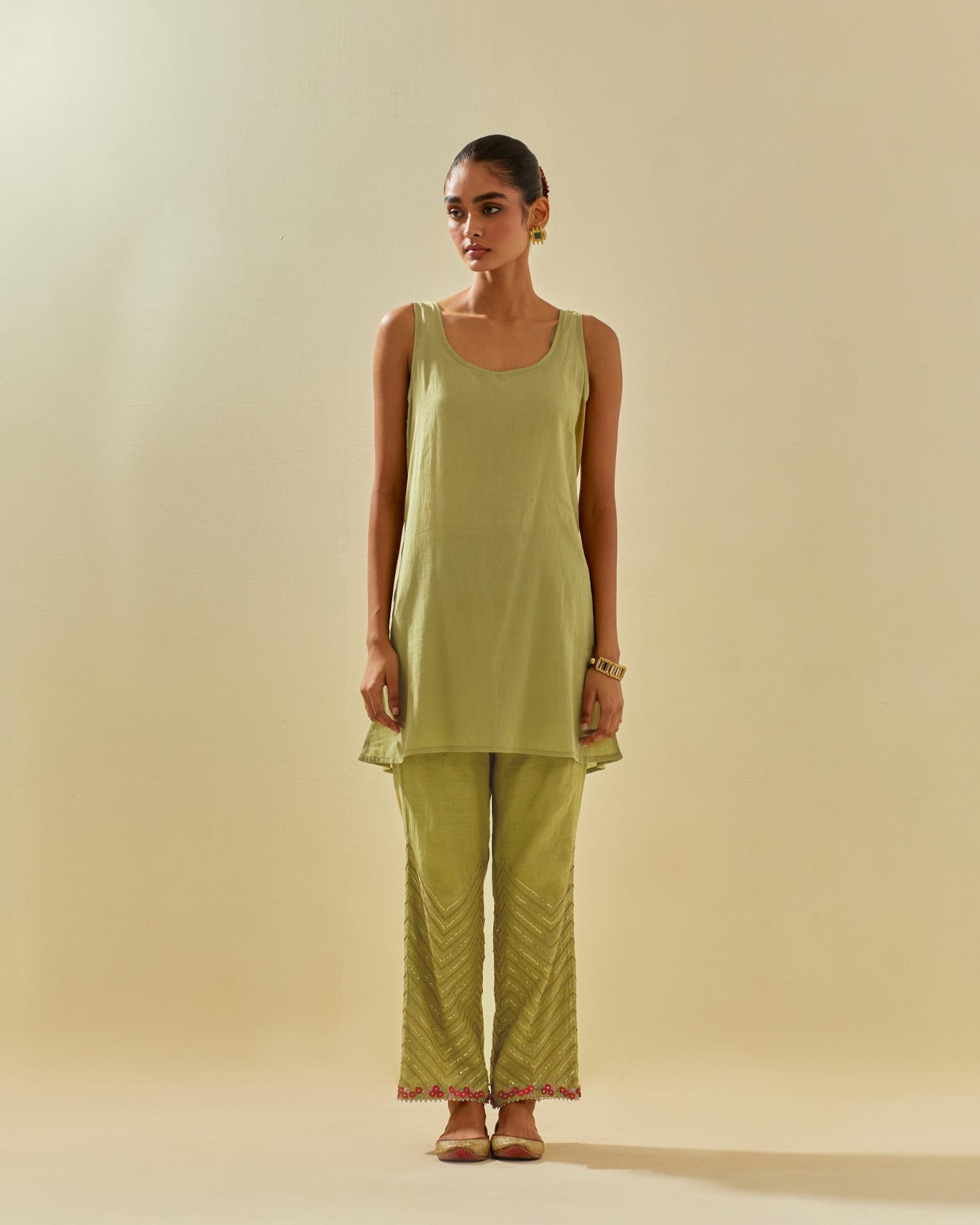 Green tissue chanderi easy fit short kurta set, highlighted with gold sequins and beads.