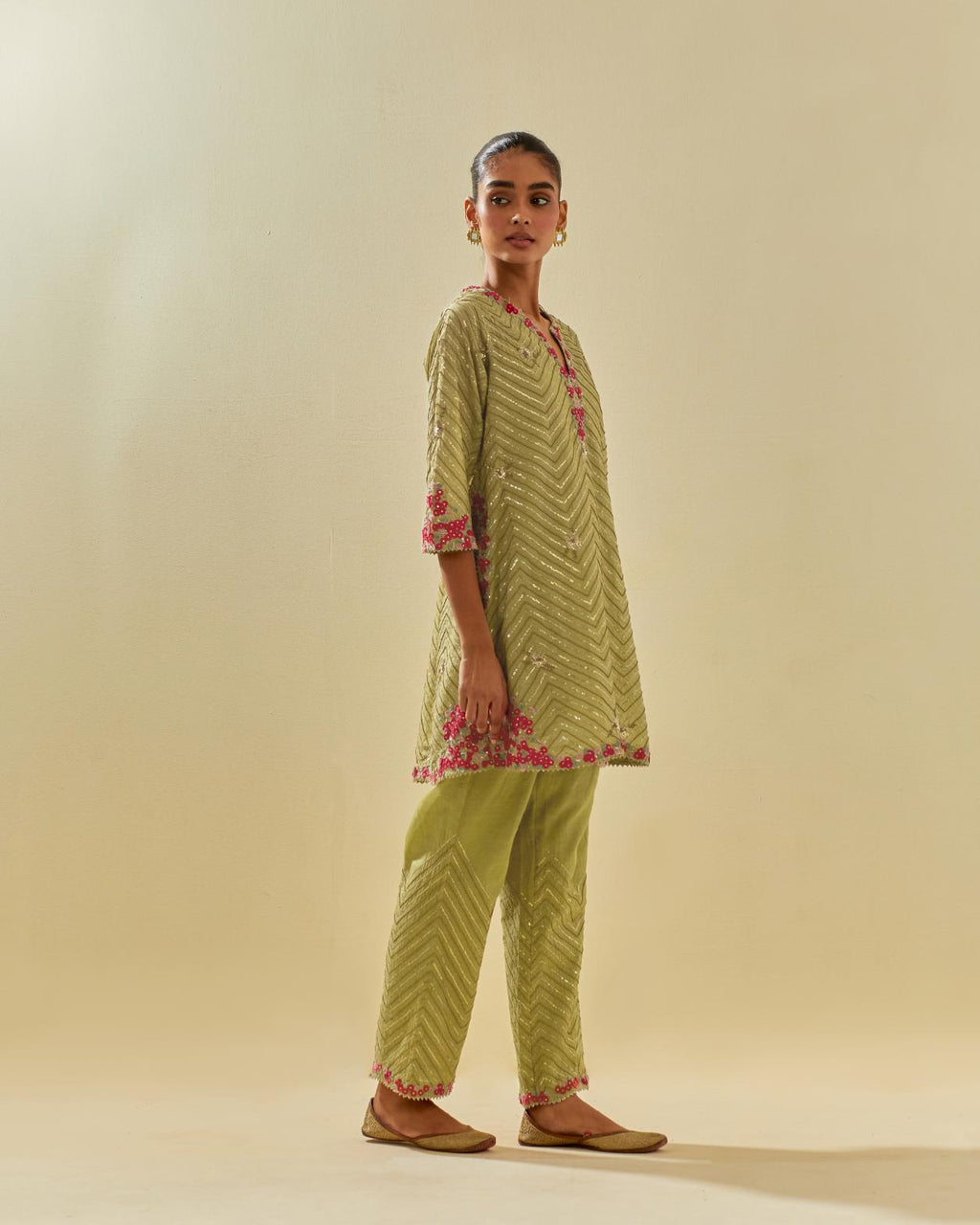 Green tissue chanderi easy fit short kurta set, highlighted with gold sequins and beads.