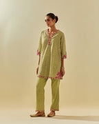 Green tissue chanderi easy fit short kurta set, highlighted with gold sequins and beads.