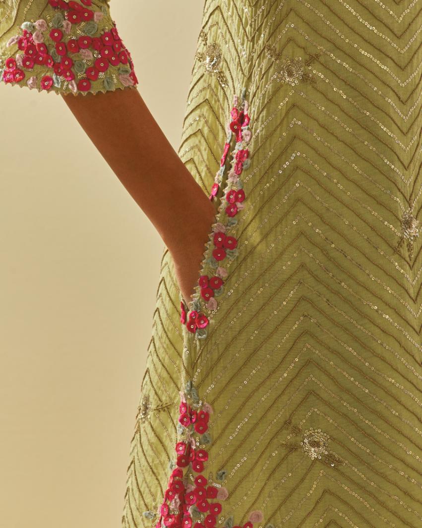 Green tissue chanderi easy fit short kurta set, highlighted with gold sequins and beads.